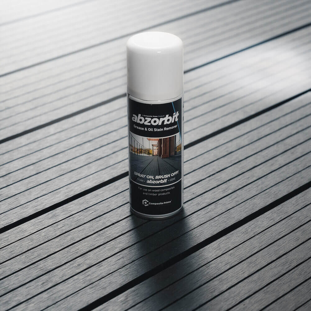 Aerosol grease and oil stain remover for composite decking