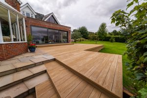Premium composite decking by brick building